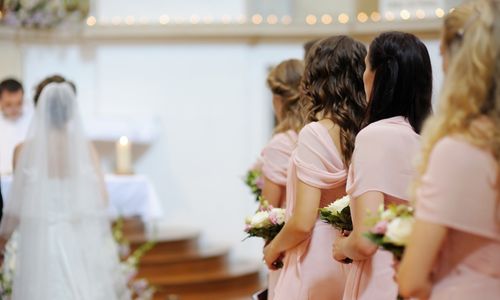 Bridesmaids and the bride at the church
