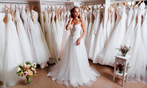 Bride trying on a used wedding dresses