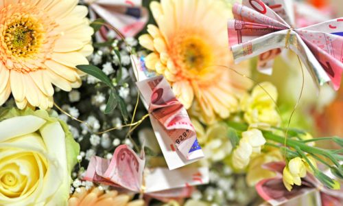 Bouquet with cash honeymoon fund gift 